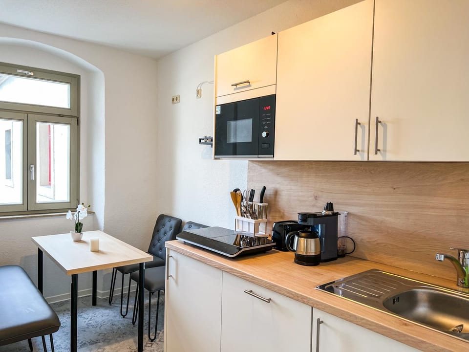 Dining area, dishwasher, microwave, kitchen