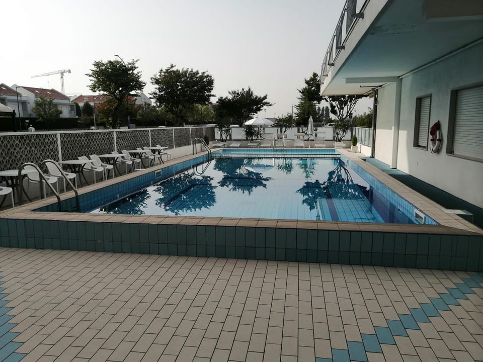 Property building, Living room, Swimming pool