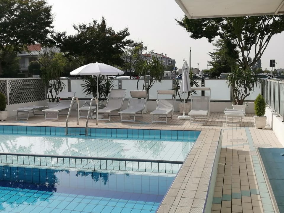 Property building, Living room, Swimming pool