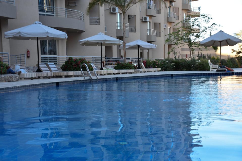 Property building, Pool view, Swimming pool, sunbed
