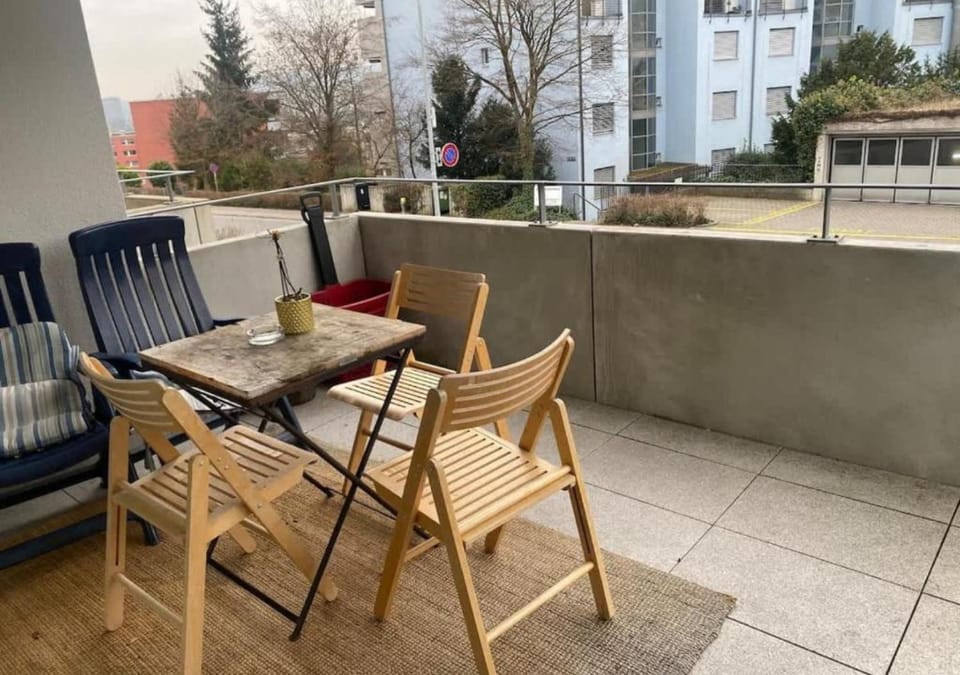 Property building, Balcony/Terrace, Seating area, Time of day
