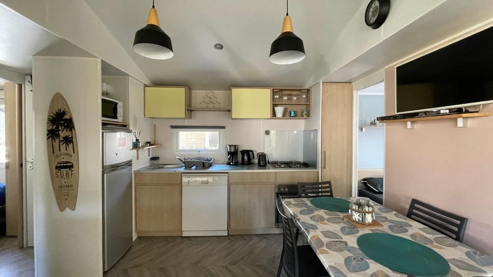 Dining area, dishwasher, microwave, oven, kitchen