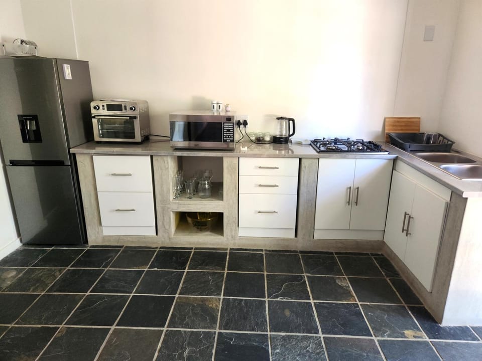 Kitchen or kitchenette, stove, toaster