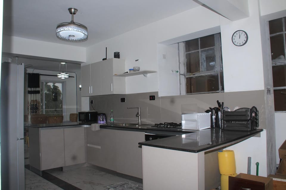 Kitchen or kitchenette, stove