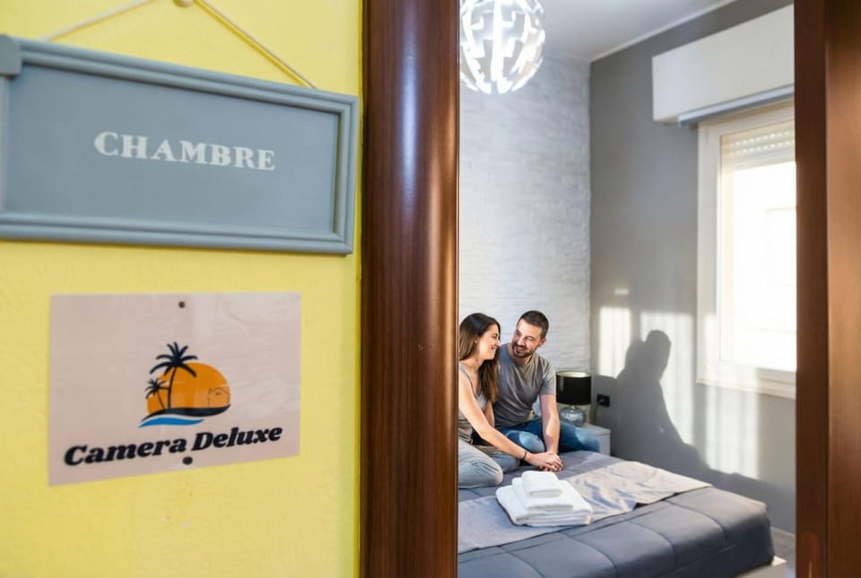 Bed, Property logo or sign, Bedroom