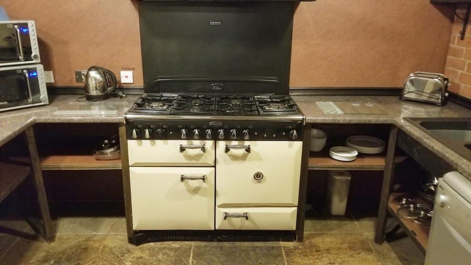 Kitchen or kitchenette, oven, stove