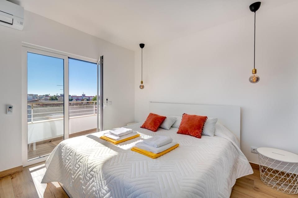 Bed, Photo of the whole room, Bedroom, towels, air conditioner