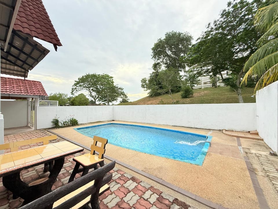Property building, Day, Seating area, Pool view, Swimming pool