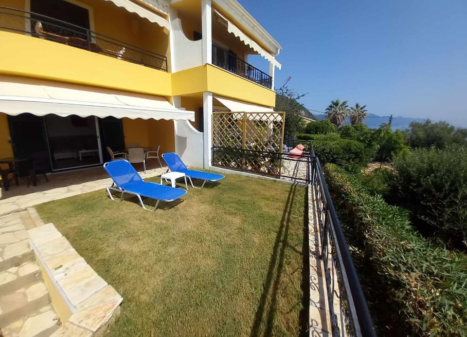 Property building, Spring, Day, Natural landscape, Garden, View (from property/room), Balcony/Terrace, Garden view, sunbed
