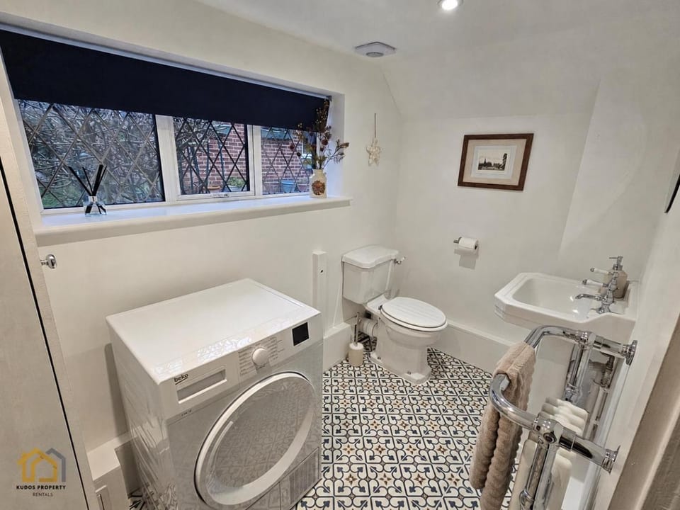 Bathroom, towels, washing machine, dryer
