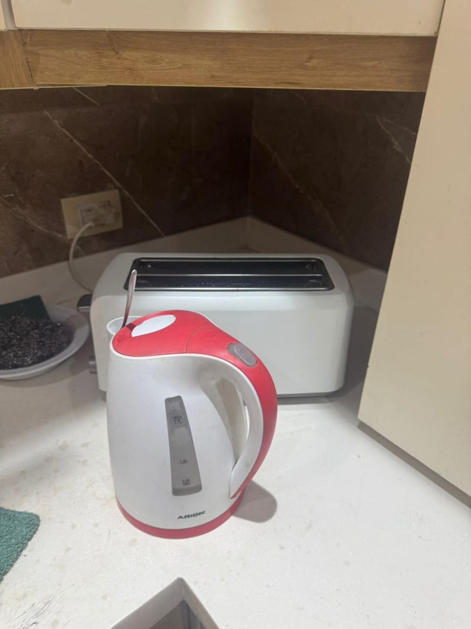 Kitchen or kitchenette, toaster