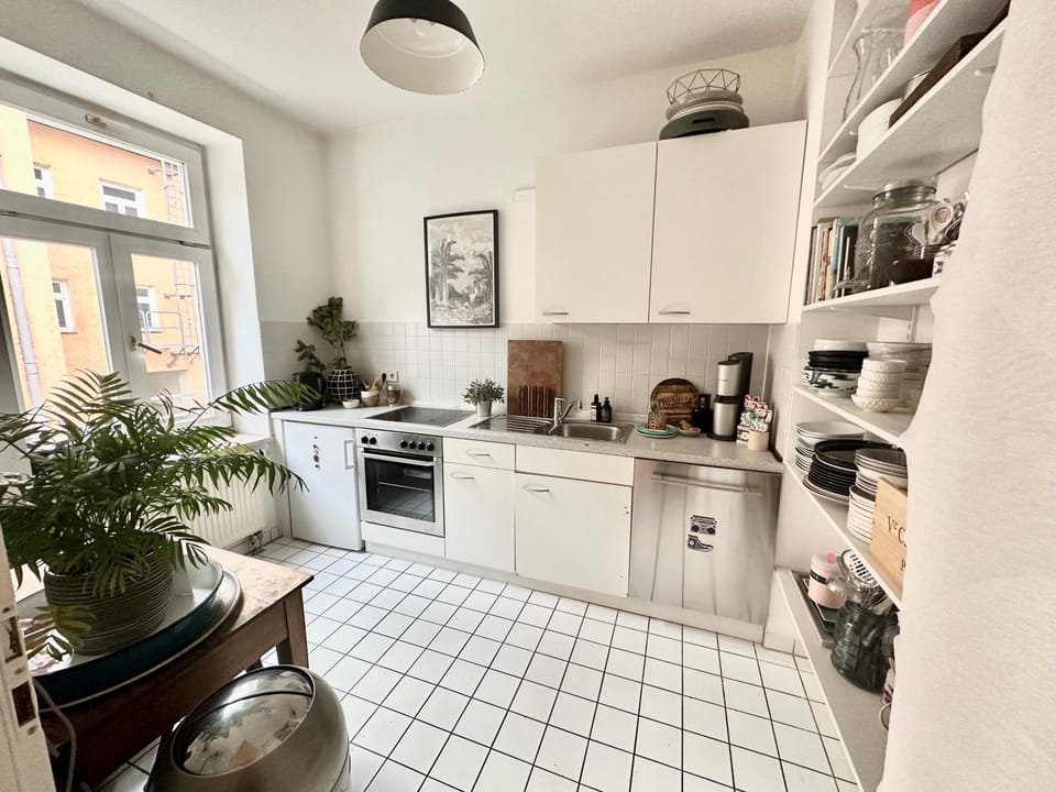 Kitchen or kitchenette, dishwasher, oven, stove