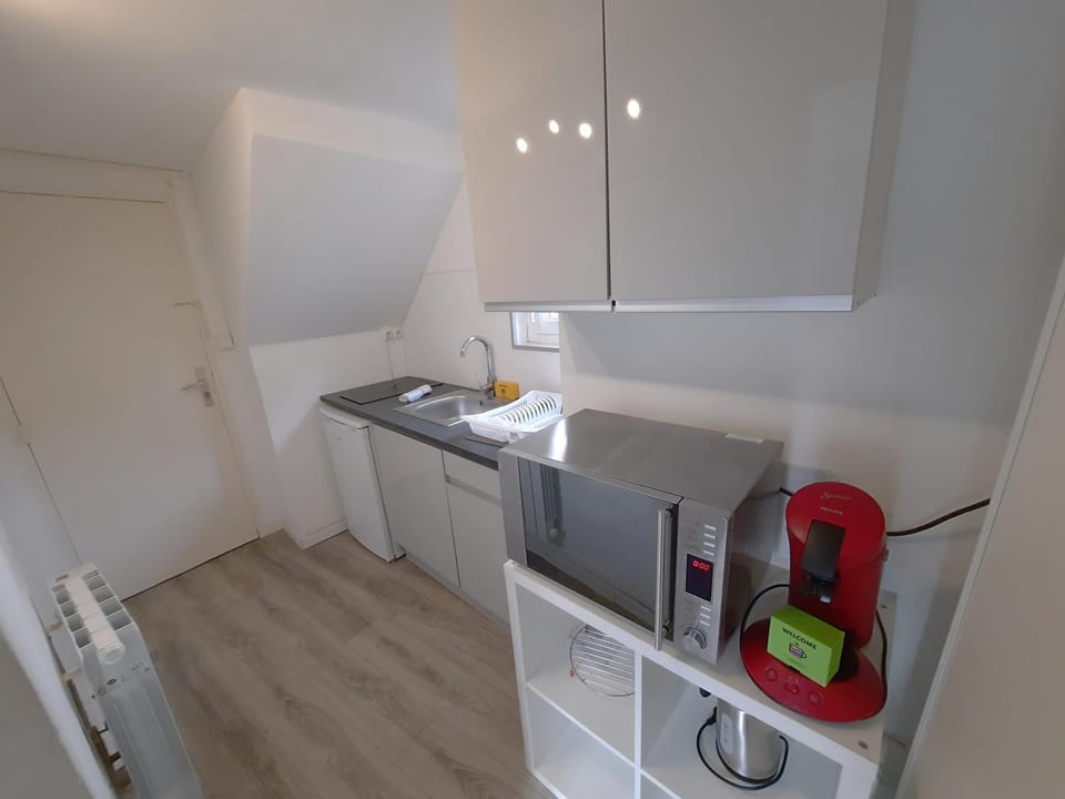 Kitchen or kitchenette, stove