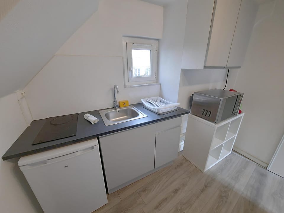 Kitchen or kitchenette, stove