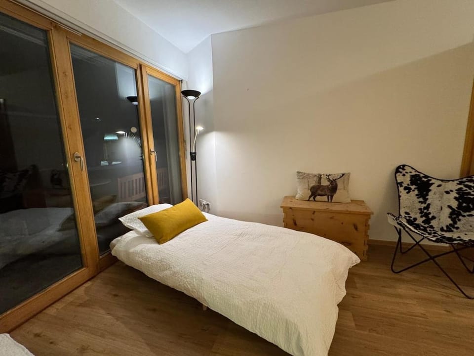 Bed, Living room, Seating area, Bedroom