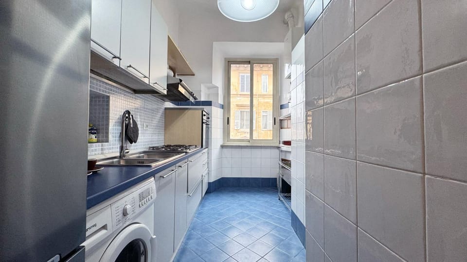 Kitchen or kitchenette, washing machine