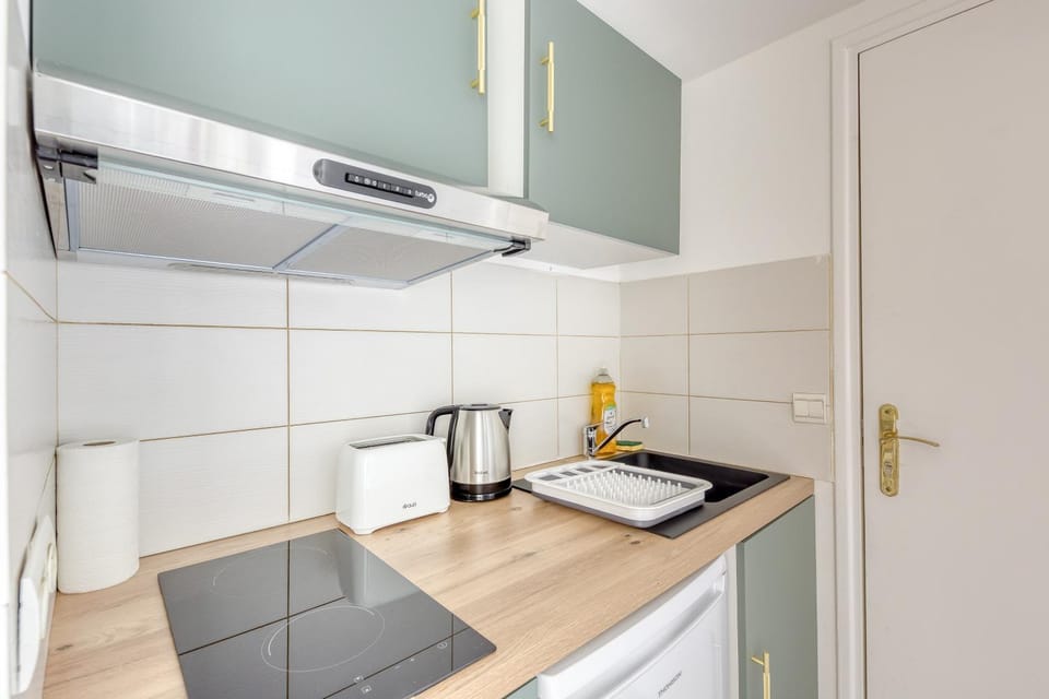 Kitchen or kitchenette, stove, toaster