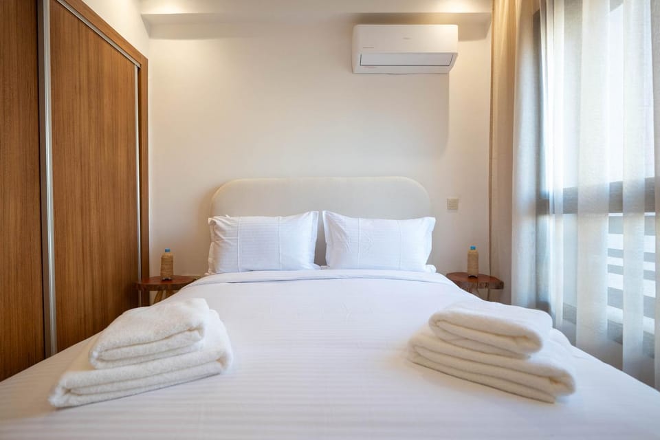 Bed, Photo of the whole room, Bedroom, towels, air conditioner