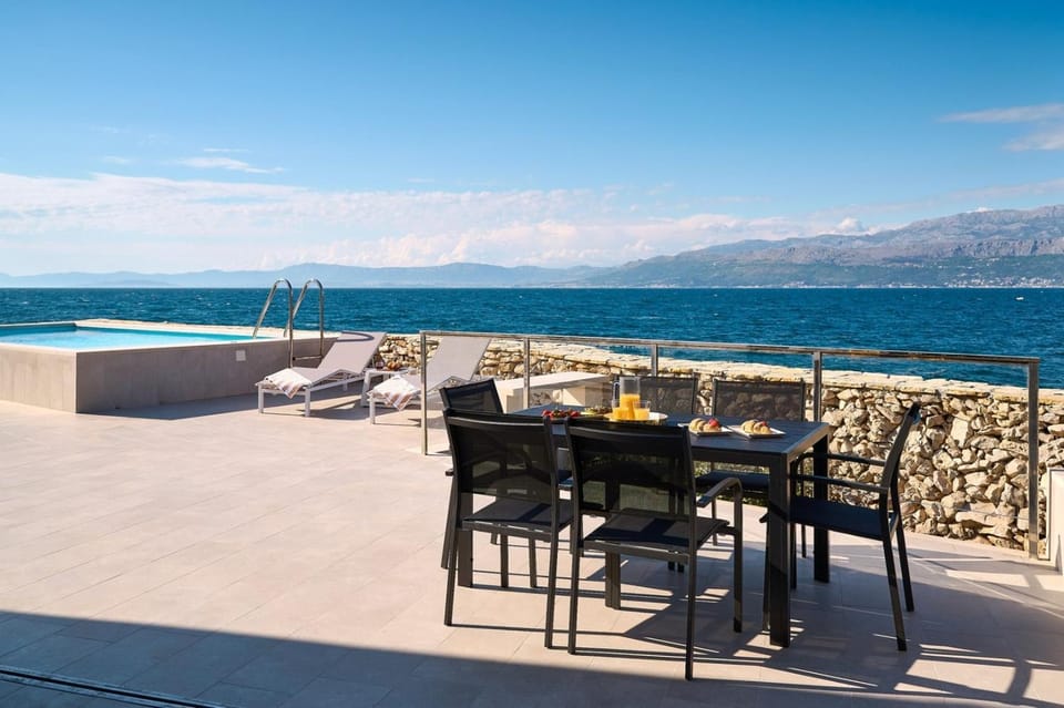 Patio, Day, Natural landscape, View (from property/room), Balcony/Terrace, Balcony/Terrace, Living room, Seating area, Dining area, Beach, Mountain view, Pool view, Sea view, Swimming pool, sunbed