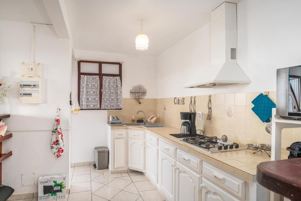 Kitchen or kitchenette, stove