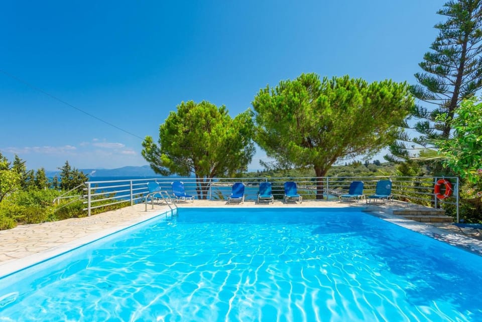 Property building, Living room, Swimming pool