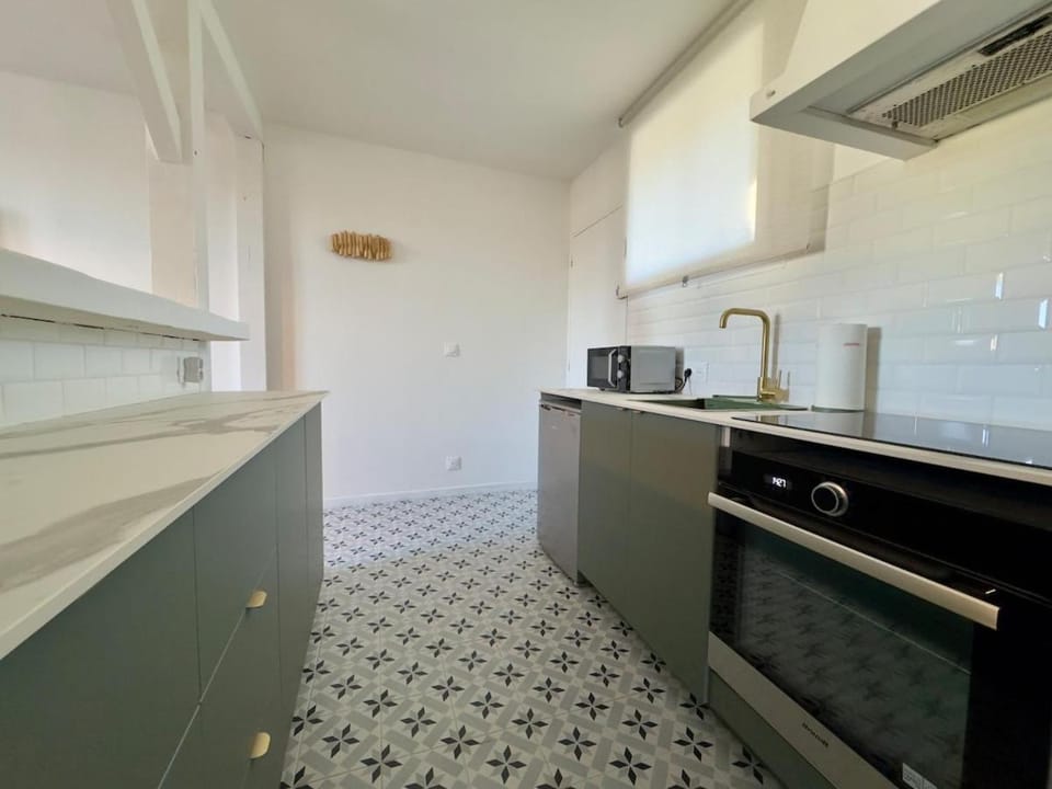 Kitchen or kitchenette, oven, stove, toaster