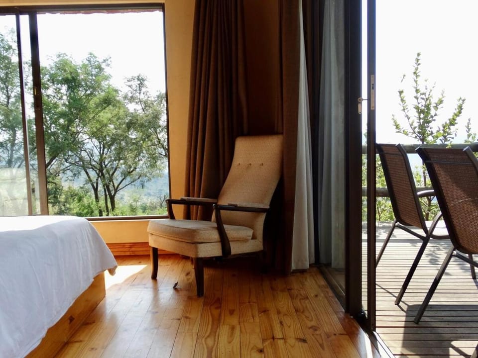 Bed, Day, View (from property/room), Seating area, Bedroom
