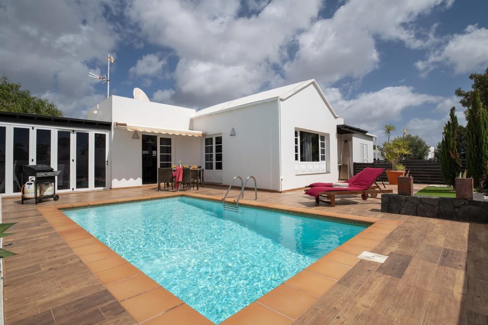 Property building, Living room, Swimming pool