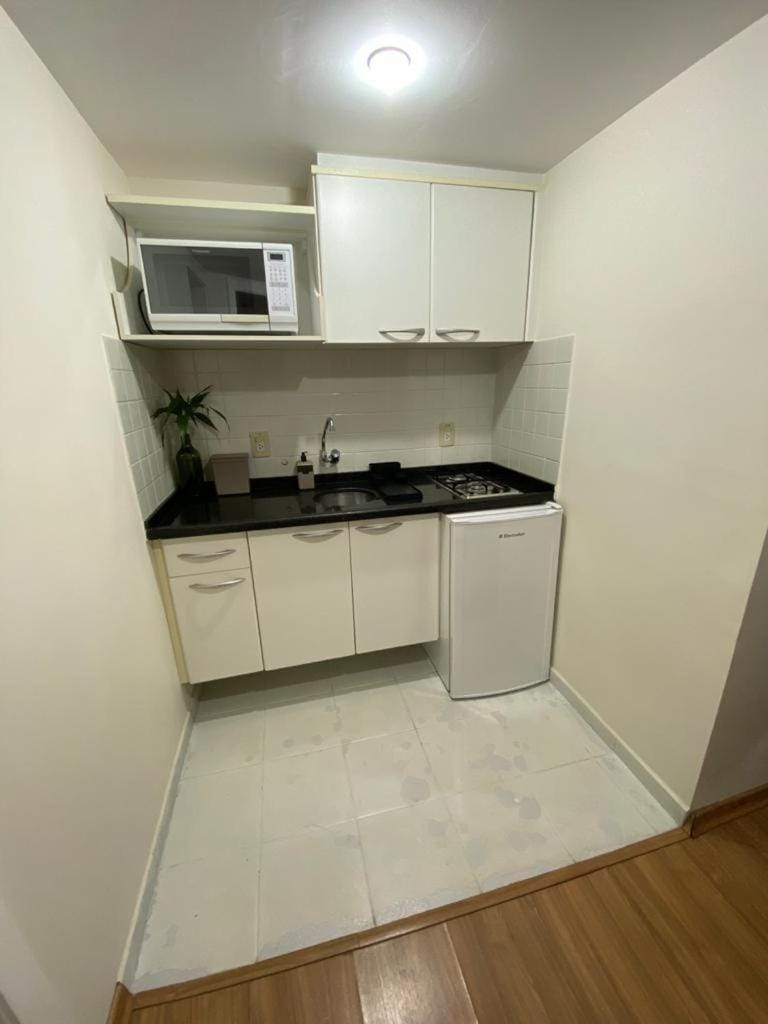 Apto para CASAL com bela VISTA, 2 camas de Solteiro, COZINHA COMPLETA, PISCINA, SAUNA, PORTARIA 24h e GARAGEM Apartment hotel in State of Goiás