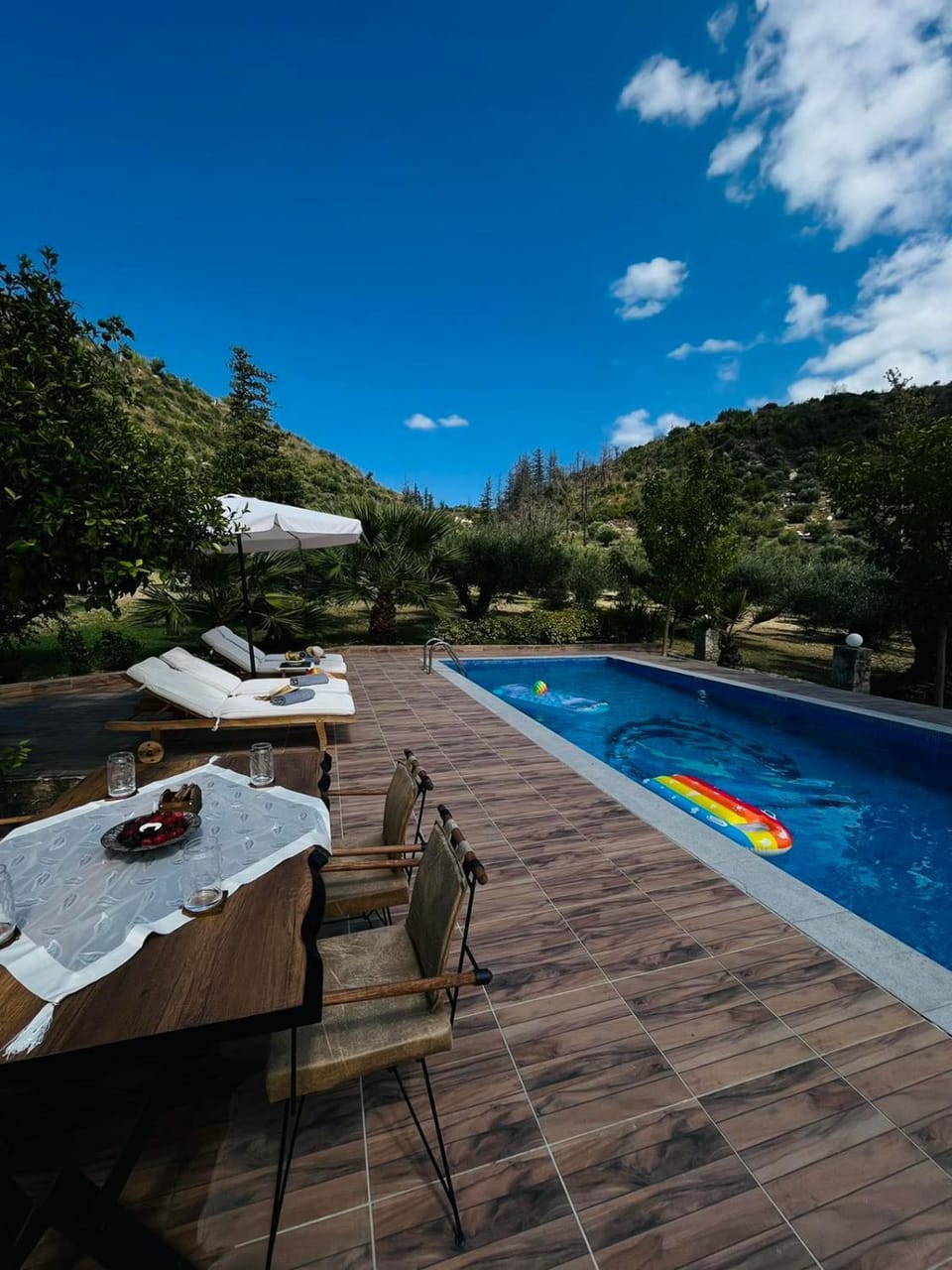 Patio, Day, Natural landscape, Mountain view, Pool view, Swimming pool, sunbed