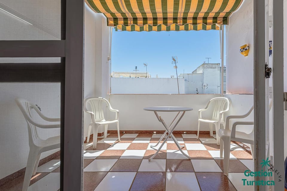 Coqueto apartamento céntrico con terraza y parking Apartment in Punta Umbría