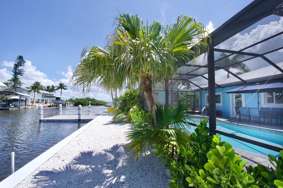 Flamingo Bay by Sun Palace Vacations House in Estero Island