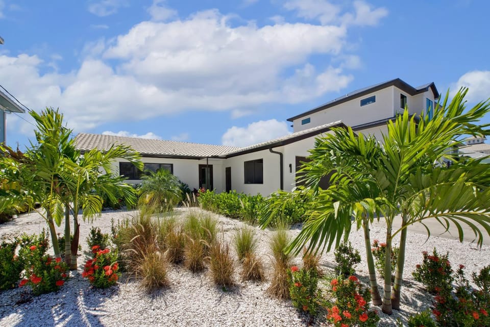 Ibis Landing by Sun Palace Vacations House in Estero Island