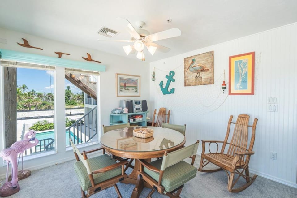 Lone Palm Retreat by Sun Palace Vacations House in Estero Island