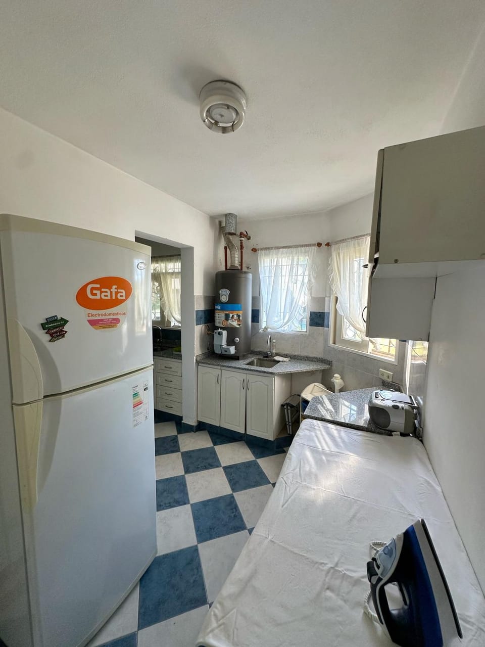 Kitchen or kitchenette, laundry