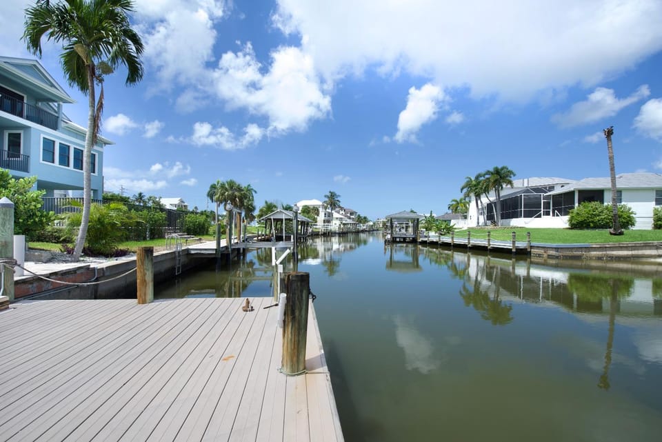 Beach and Bay by Sun Palace Vacations House in Estero Island