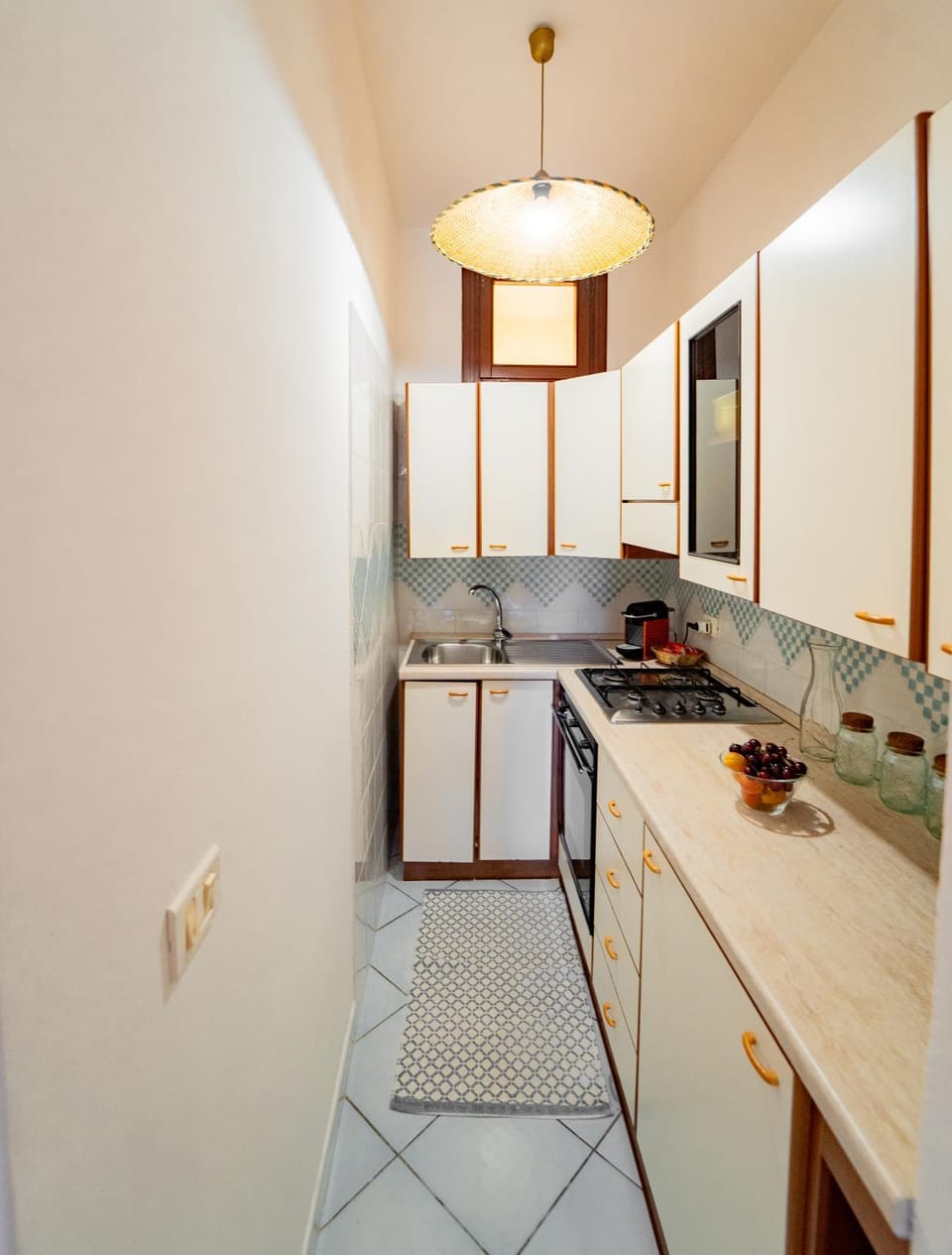Kitchen or kitchenette, dishwasher, oven, stove