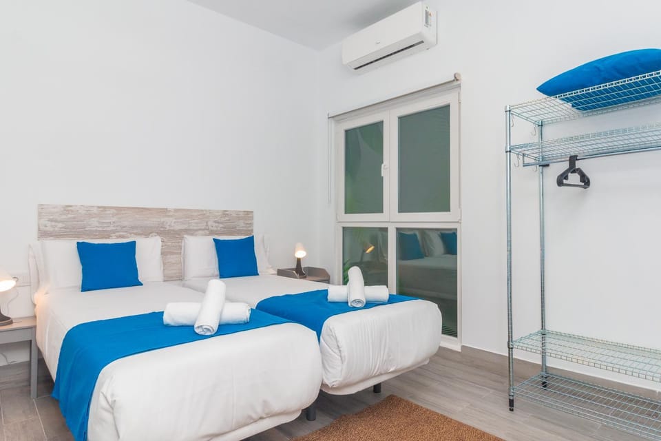 Bed, Photo of the whole room, Bedroom, towels, air conditioner