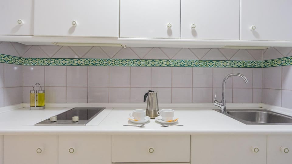 Kitchen or kitchenette, stove