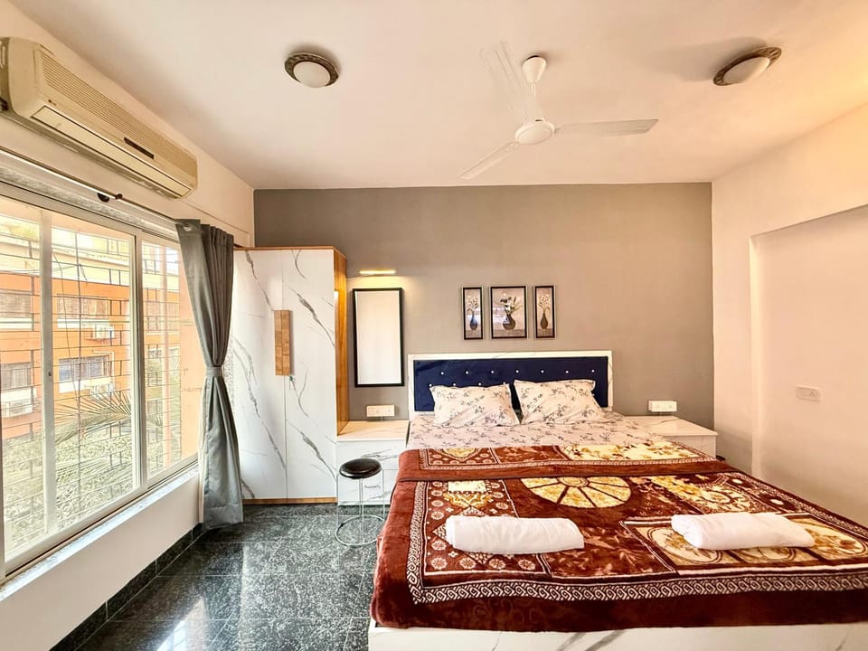 Bed, Bedroom, towels, wardrobe, air conditioner