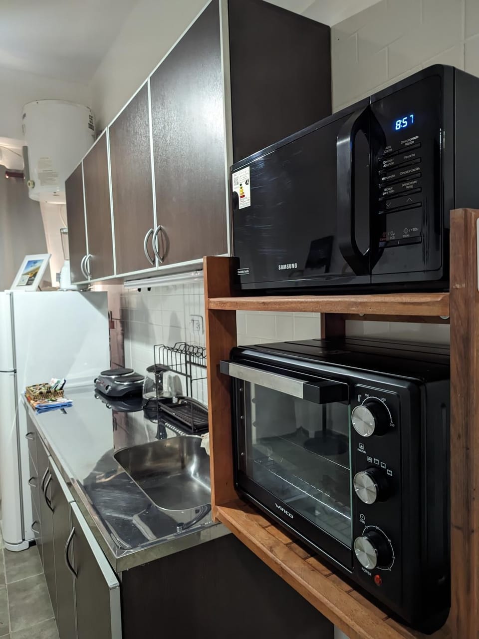 Kitchen or kitchenette, oven, stove, toaster
