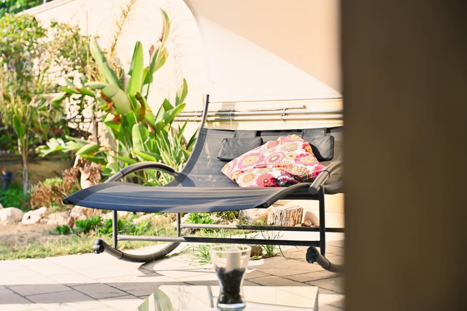 Property building, Patio, Spring, Day, Garden, View (from property/room), Living room, Garden view, Garden view, sunbed