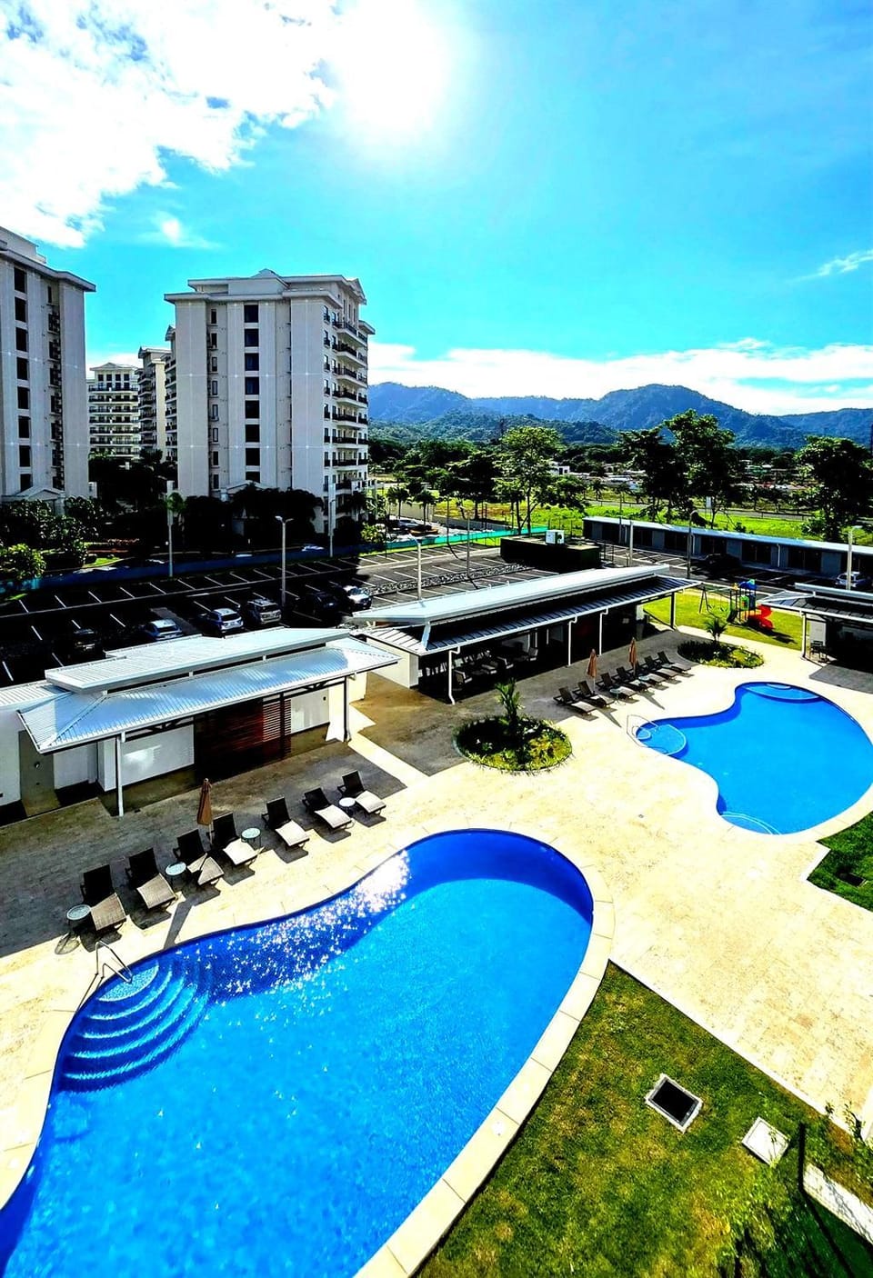 Property building, Day, Natural landscape, Mountain view, Pool view, Swimming pool, sunbed