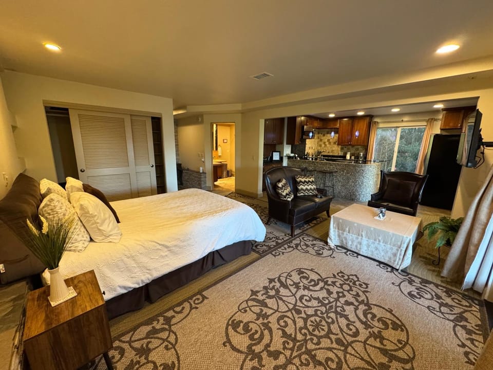 Bed, Living room, Seating area, Bedroom