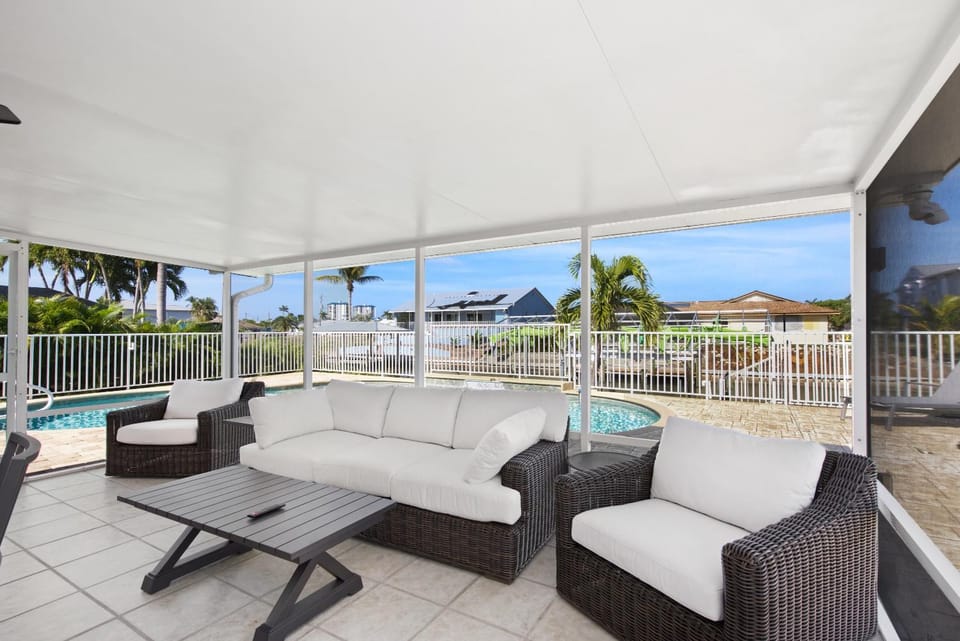 The Pink Lily by Sun Palace Vacations House in Estero Island