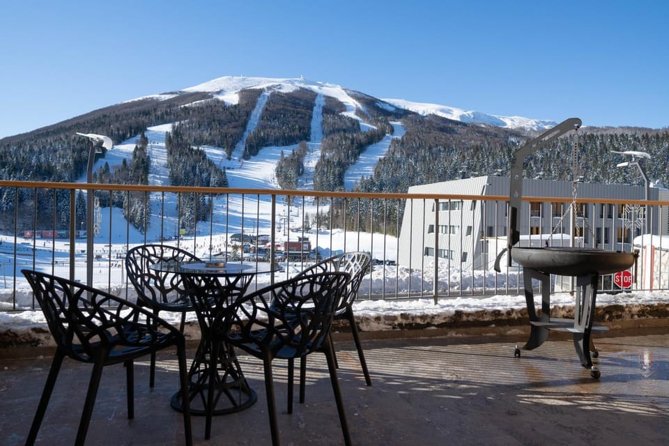 Property building, Nearby landmark, Day, Winter, View (from property/room), Balcony/Terrace, Dining area, Mountain view