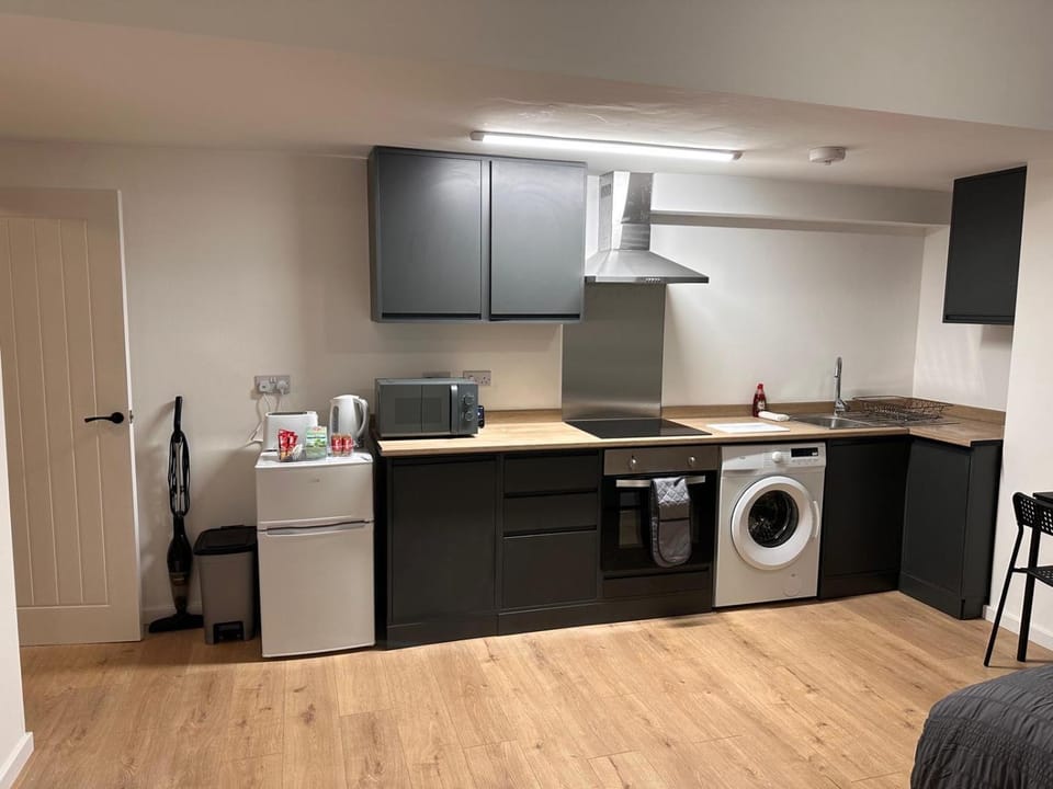 Kitchen or kitchenette, oven, stove, toaster