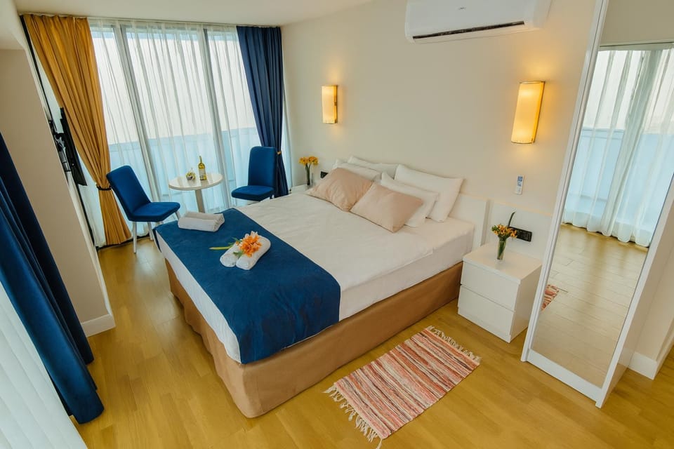 Bed, TV and multimedia, Bedroom, towels, wardrobe, air conditioner