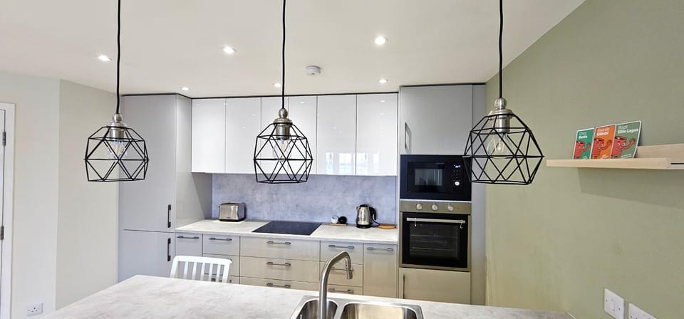 Kitchen or kitchenette, oven, stove, toaster