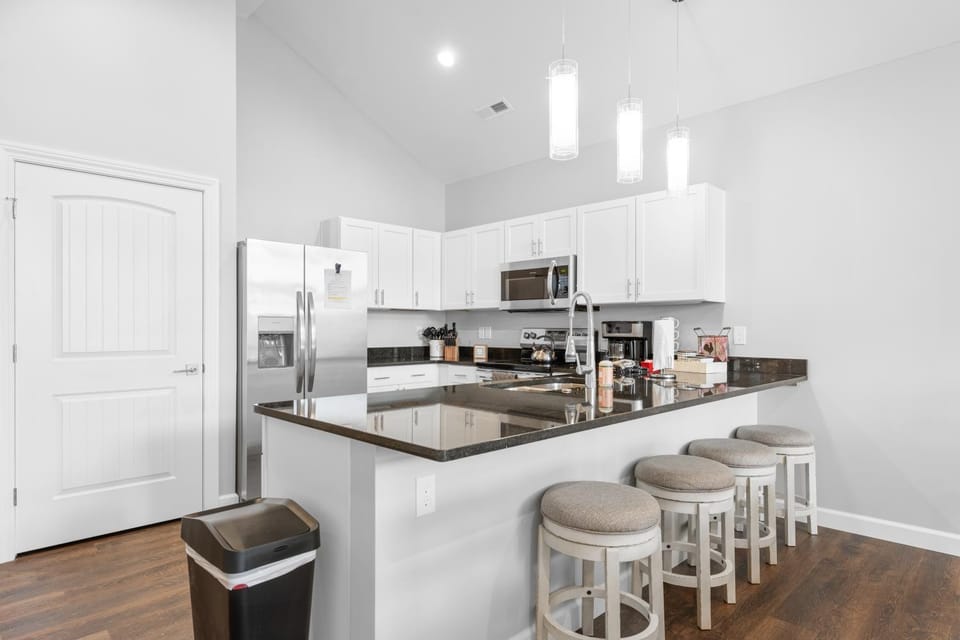 Kitchen or kitchenette, dishwasher, oven, stove, toaster